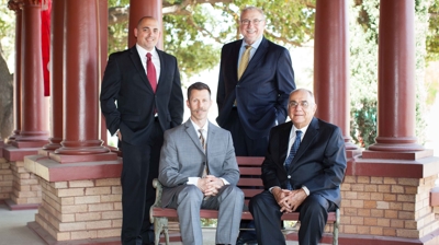 From top from left to right: Jesse J. Lotspeich, Attorney; James M. Stanley From bottom left to right: John R. Burton, Attorney; Photo